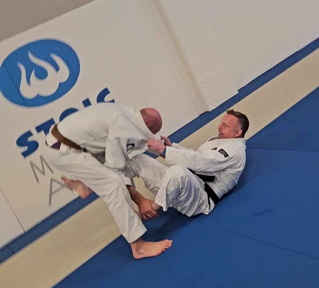 Adults drilling BJJ technique at Stoic Martial Arts in Chanhassen, Minnesota